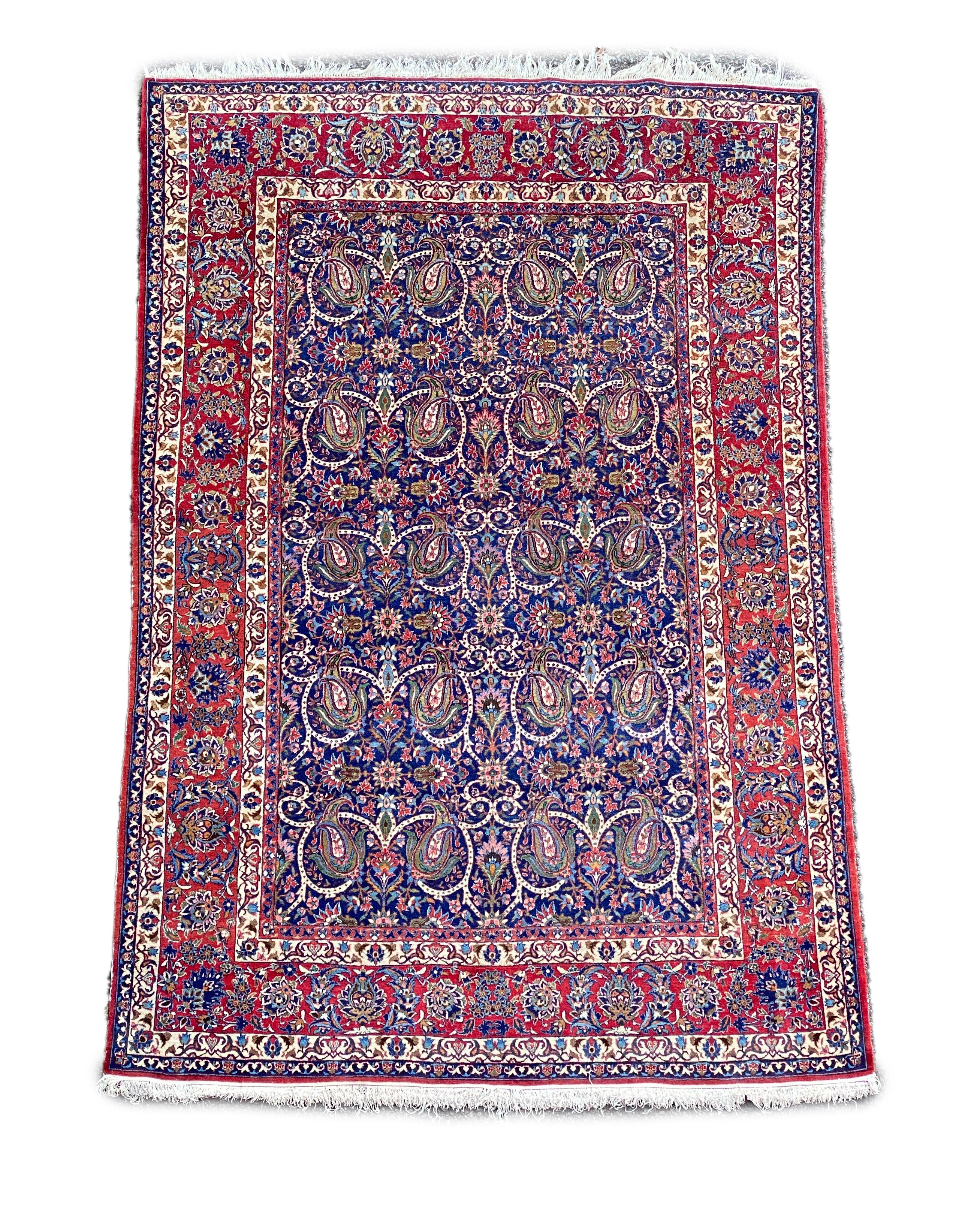 A Tabriz blue ground rug, first half 20th century, 225 cm x 155 cm